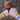 Three people wearing the rosary bracelet for Jubilee 2025