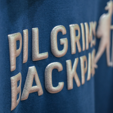 PILGRIM'S BACKPACK PETROL BLUE SWEATSHIRT WITH SILVER LOGO THICK PRINT